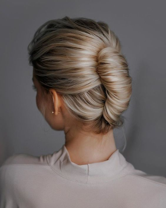 The Side Roll Bun Easy Party Hairstyles For Medium Hair