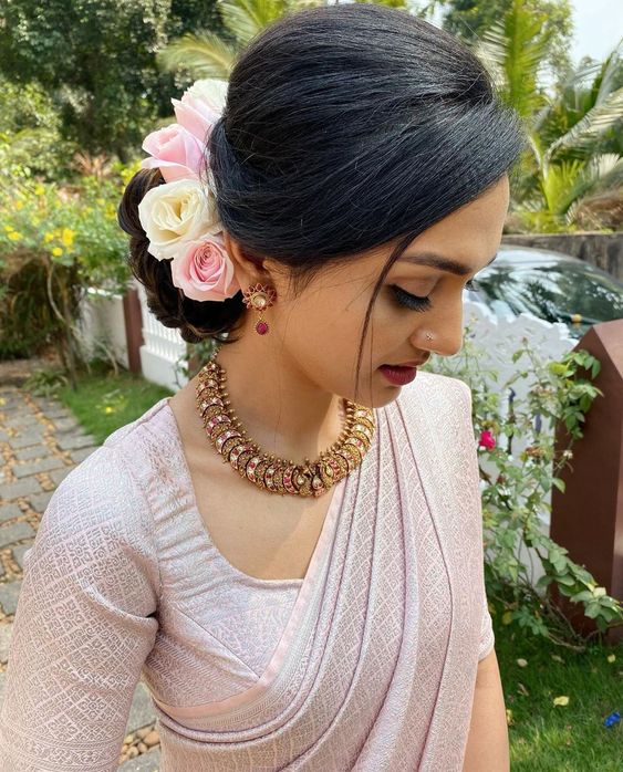 What kind of hairstyle suits for saree? - Quora