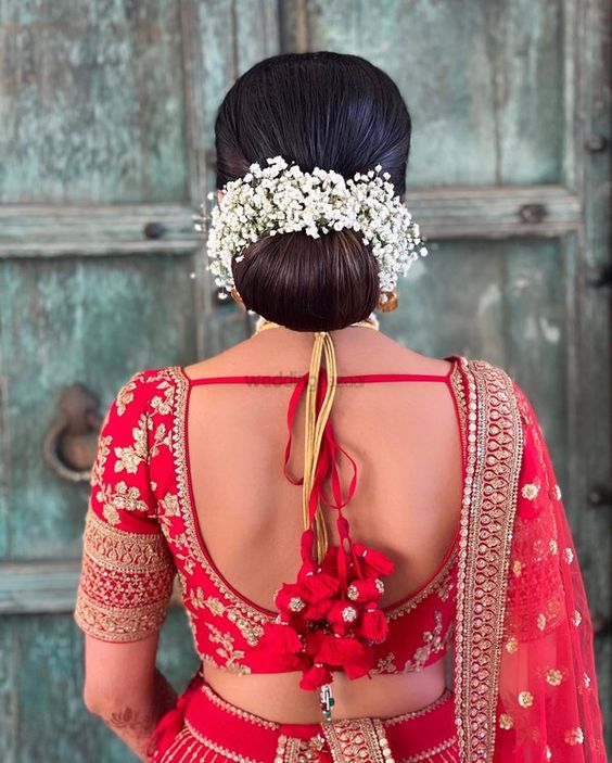 50 Simple Hairstyles on Saree for Traditional Look 2023 | Saree hairstyles,  Trendy wedding hairstyles, Simple hairstyle for saree